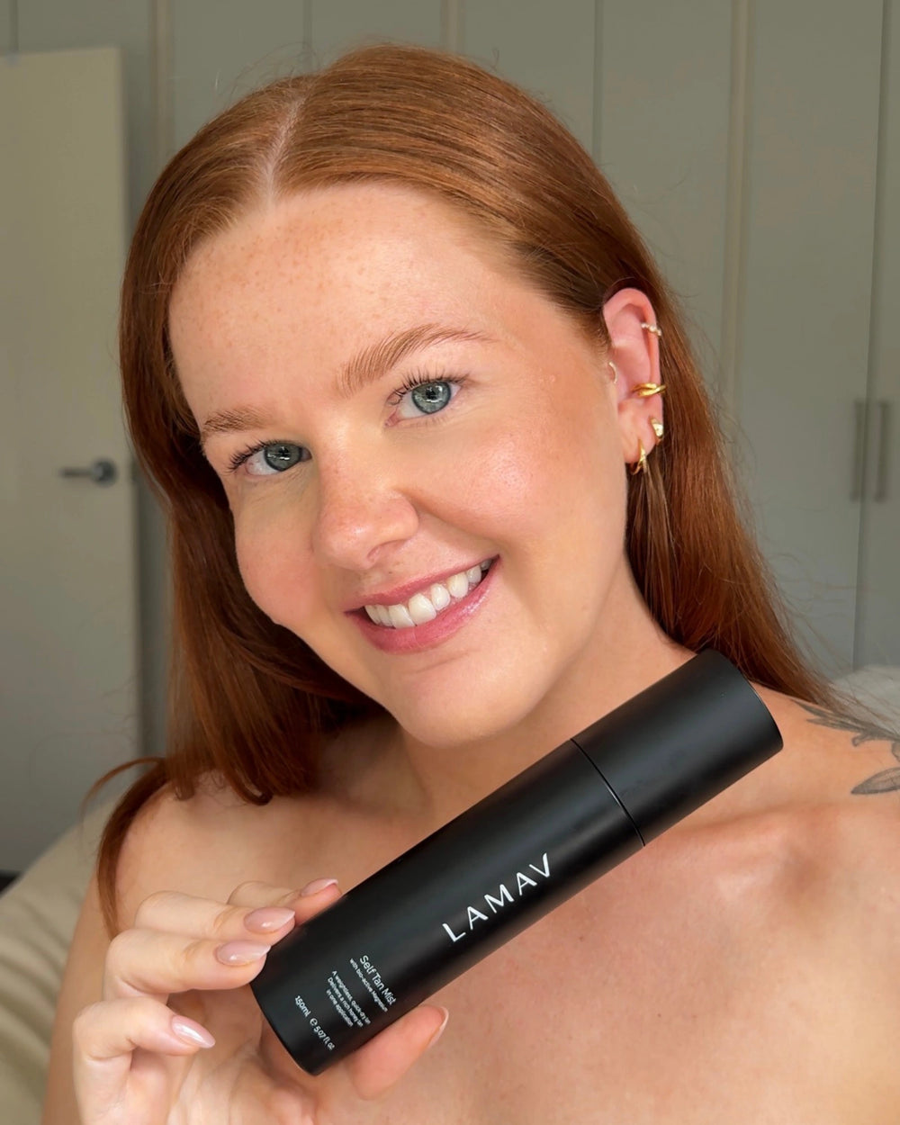 Self Tan Mist by LAMAV — front view of the black spray bottle | weightless streak free tan