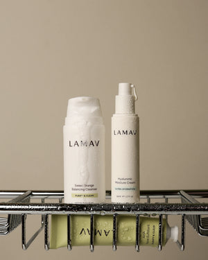 Skincare Bundle by LAMAV — wet cleanser, cream, and exfoliant on a wire shower caddy | refreshing daily wash