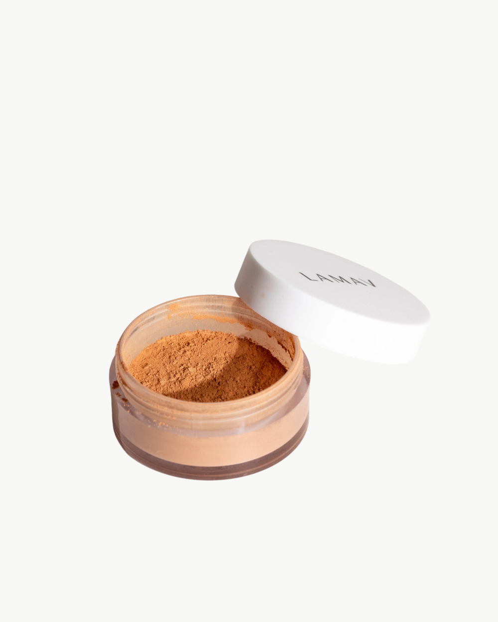 Sunkissed Bronzer by LAMAV — open jar with lid on beige backdrop | achieve a healthy bronzed look
