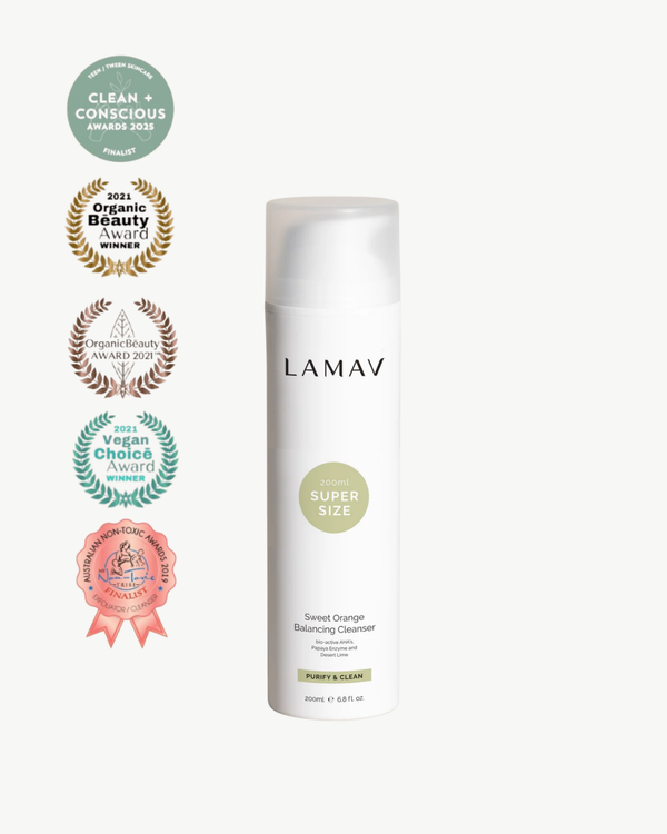 Super Sized Sweet Orange Balancing Cleanser by LAMAV — bottle next to industry awards | award-winning organic care