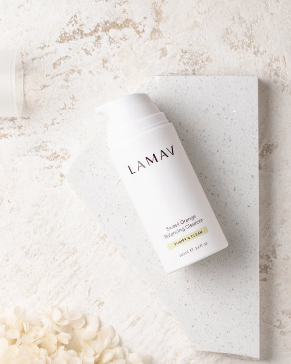 Sweet Orange Balancing Cleanser by LAMAV — 100ml bottle on white stone slab | deeply purifies and cleanses oily skin