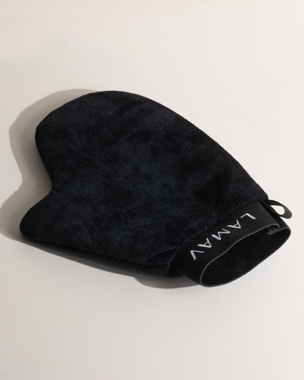 Tan Application Mitt by LAMAV — black velvet mitt angled on white background | protects hands from stains