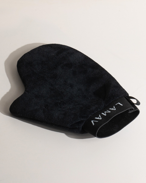 Tan Application Mitt by LAMAV — black mitt resting flat on a table | streak-free tan application