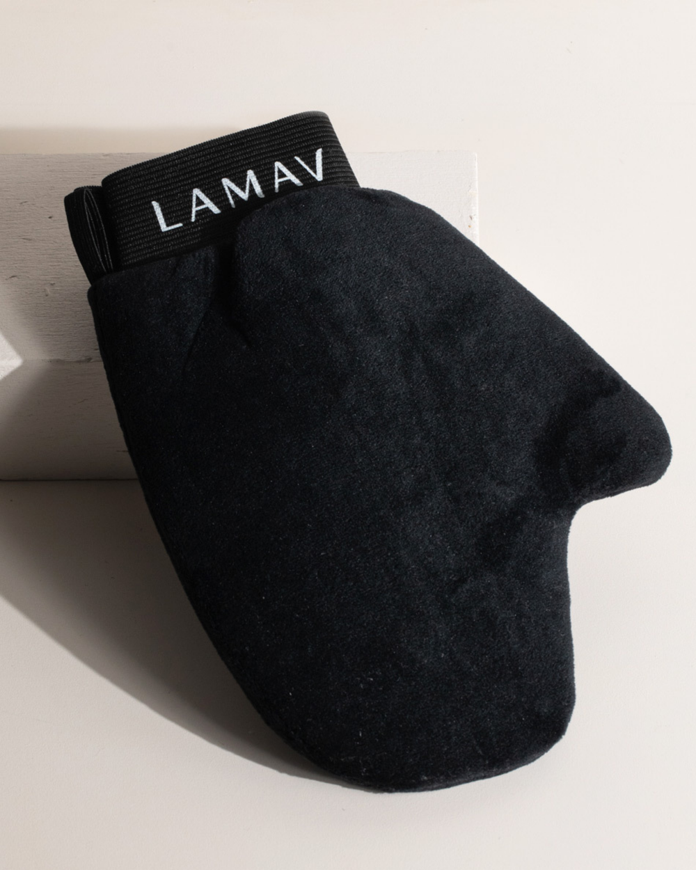 Tan Application Mitt by LAMAV — black velvet mitt angled on white background | protects hands from stains