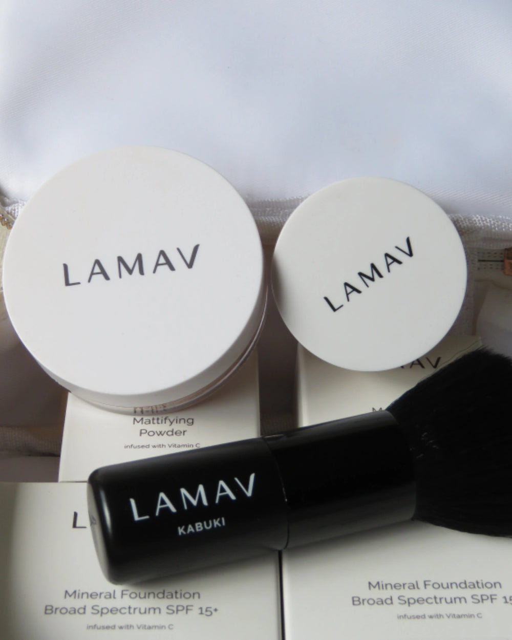 Teen Makeup Starter Kit by LAMAV — mineral foundation, mattifying powder and brush on white | gentle organic makeup
