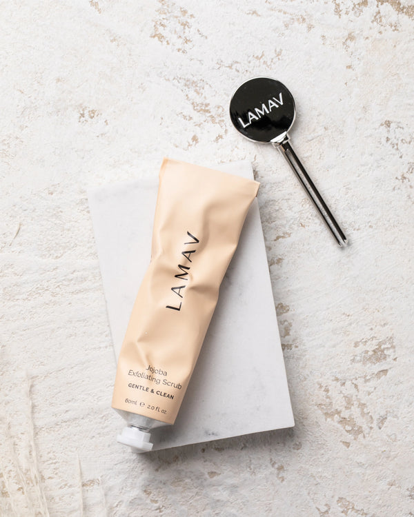 Tube Key by LAMAV — silver key next to beige scrub tube on stone | zero waste skincare tool