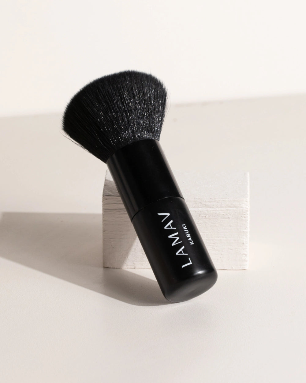 Vegan Kabuki Brush by LAMAV — black makeup brush isolated on white | soft synthetic bristles for mineral powder