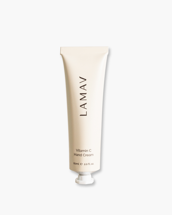 LAMAV Vitamin C Hand Cream — 60ml tube on a beige surface | vitamin C brightening and hydrating hand cream